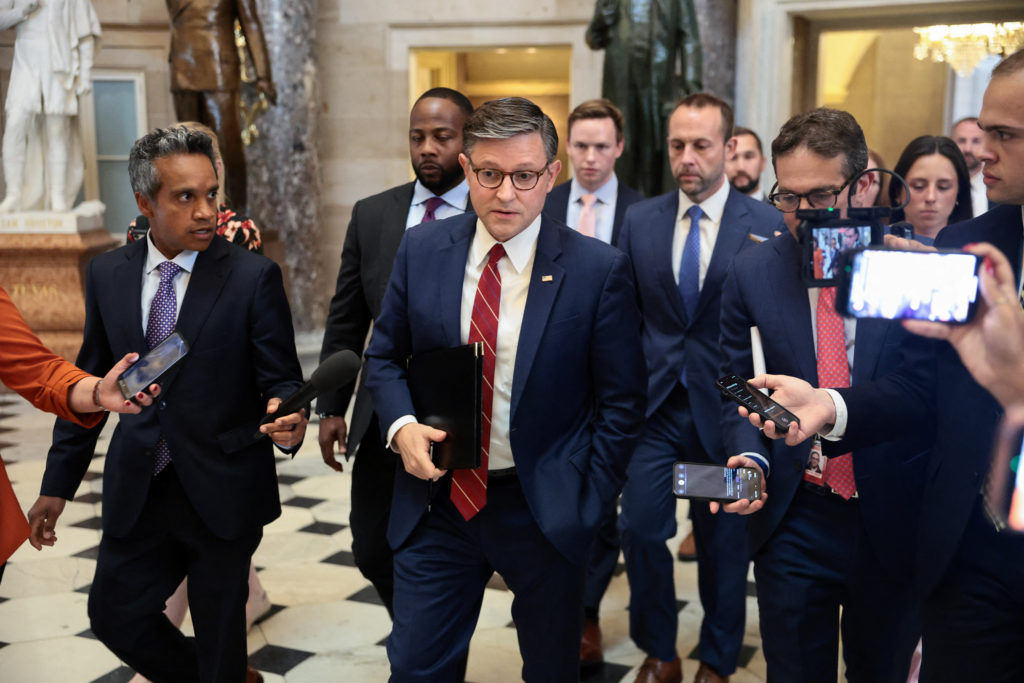 U.S. House Speaker Mike Johnson walks through the Capitol surrounded by reporters on June 3, 2026.