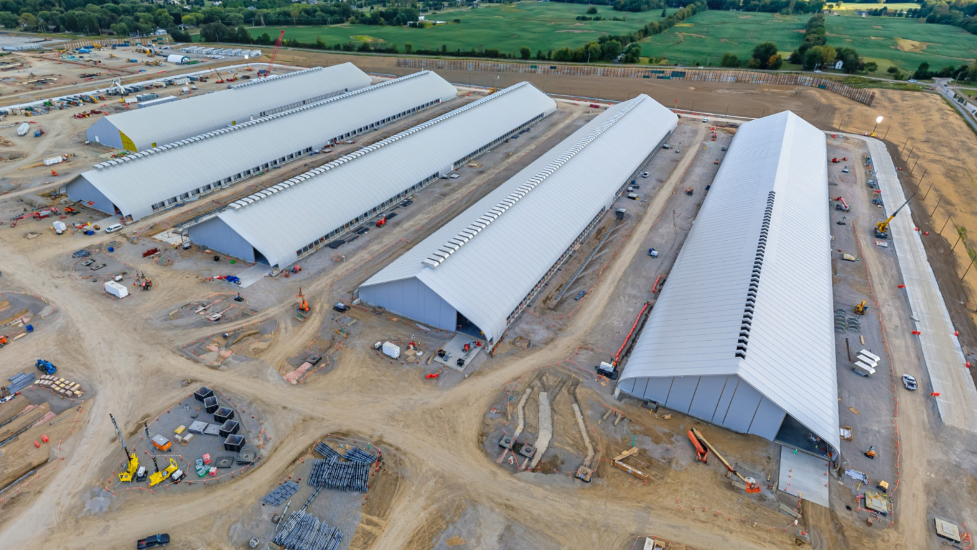 Aerial view of six white fabric tents under construction at Meta's New Albany, Ohio data center site.