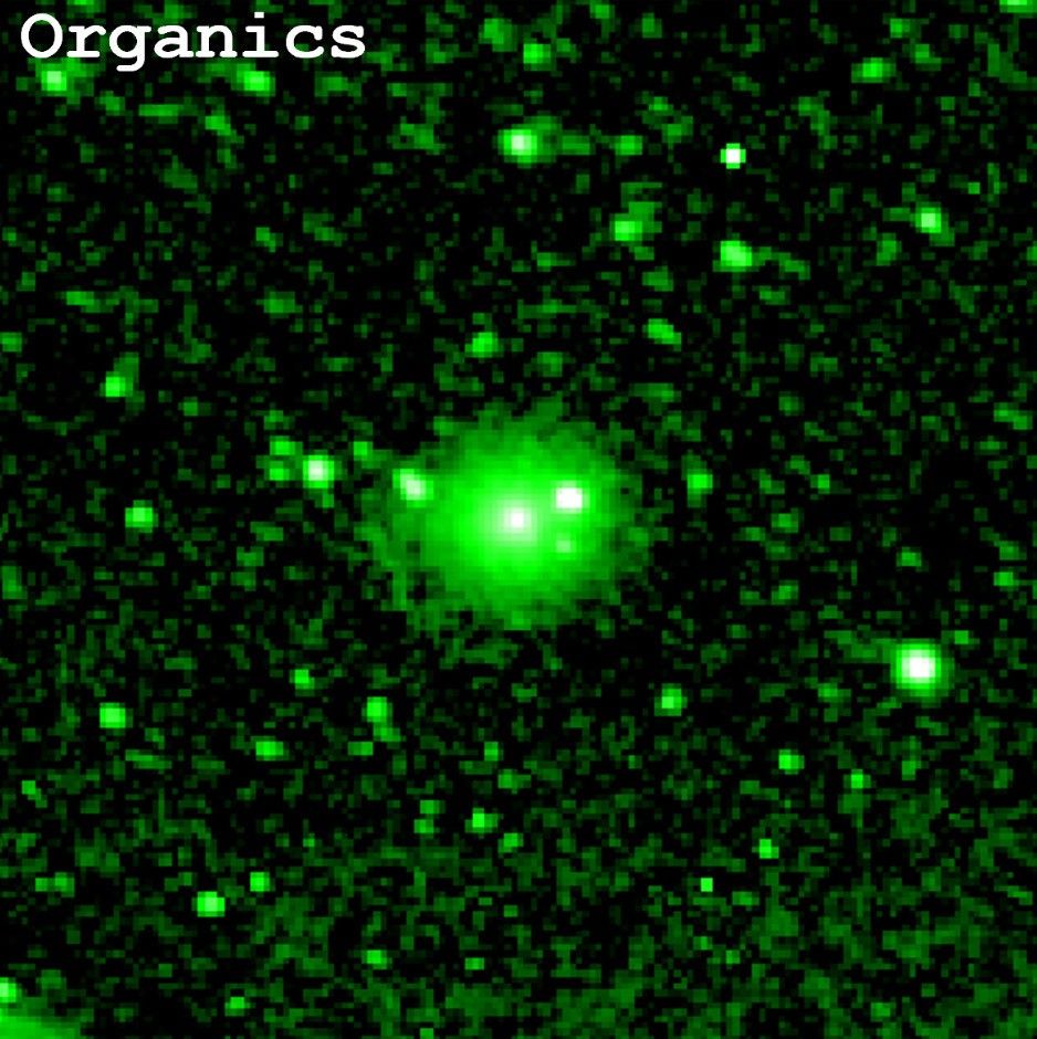 NASA SPHEREx infrared image of comet 3I/ATLAS labeled 'Organics,' showing a bright extended coma against a star field.